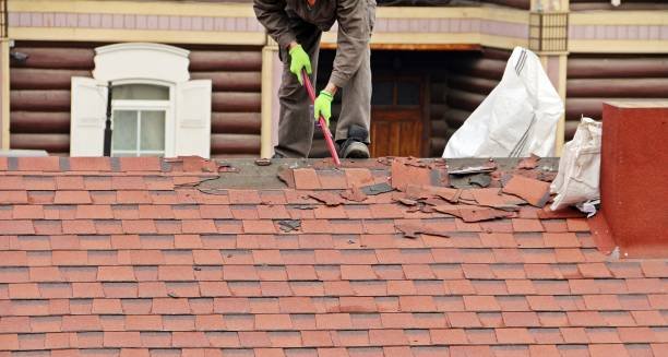 Worker in proper outfit repairing a roof, offering fast and reliable emergency roof repair services in South Bend, IN.
