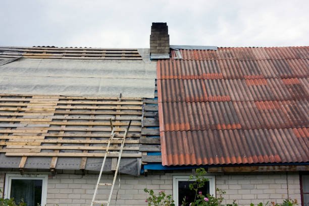 Image of roofing materials and tools used for re-roofing a house, showcasing various shingles and installation equipment.