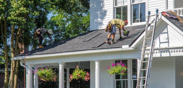 A person using a power tool to clean a window, demonstrating effective maintenance techniques for home improvement — part of the broader care offered by roof repair services in Goshen IN.