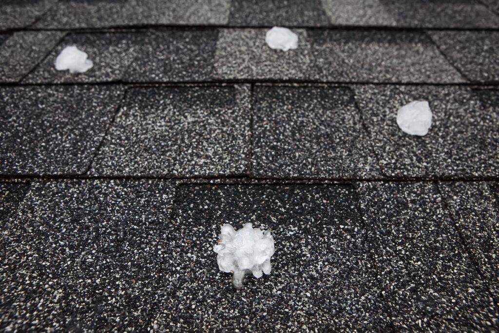 Residential hail damage roof repair covered by insurance company