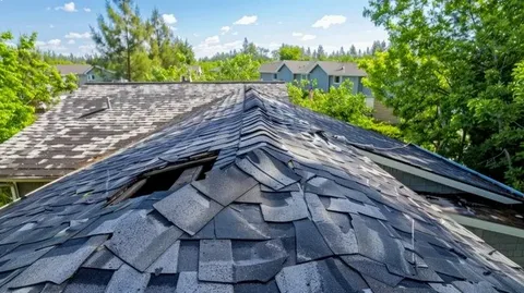 Emergency tarp installed on hail damage roof after storm damage